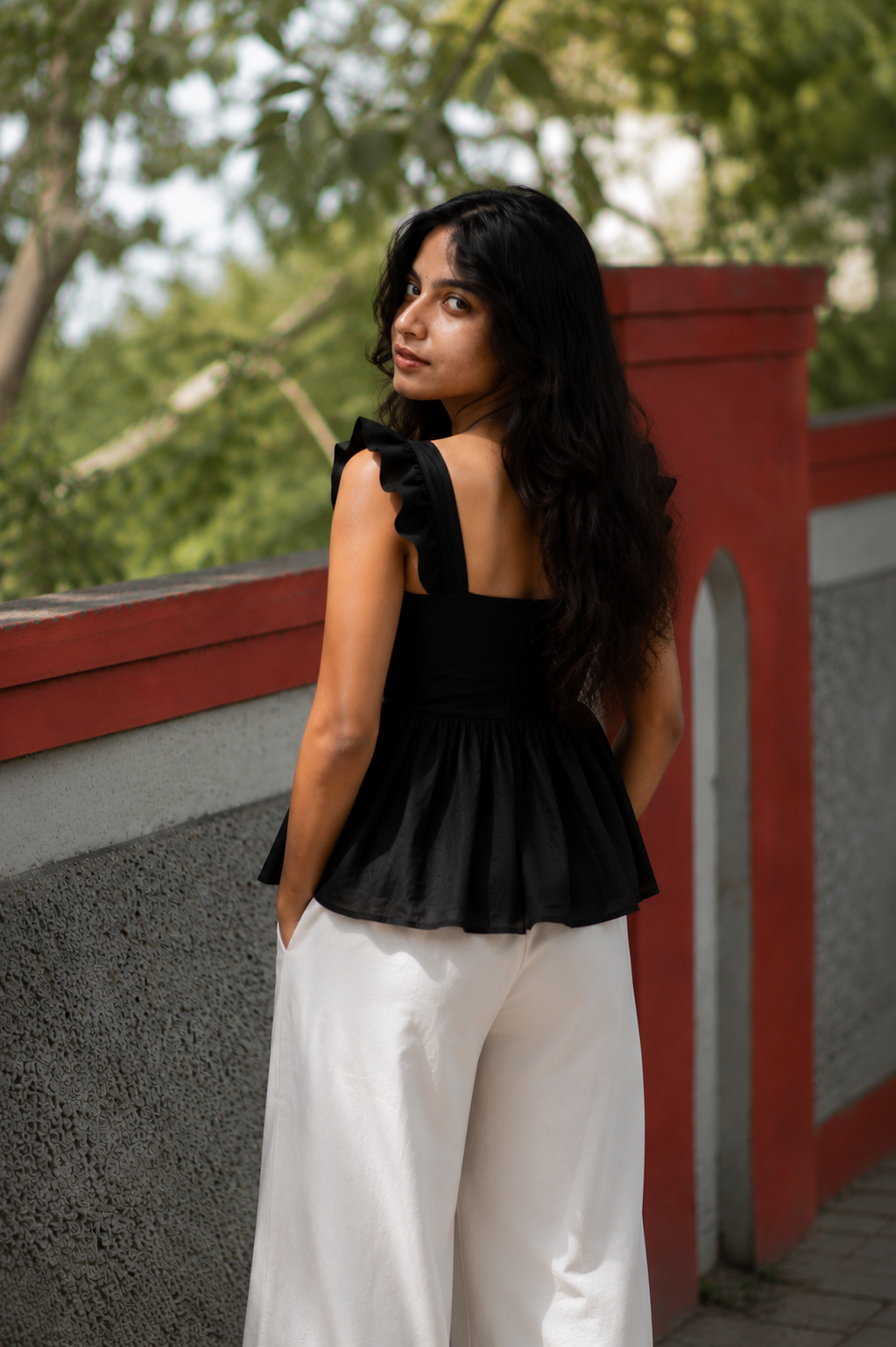 Onyx Peplum Top