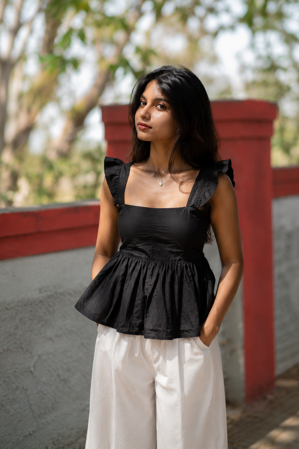 Onyx Peplum Top